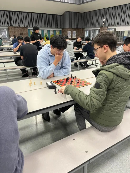 A closeup on a chess match